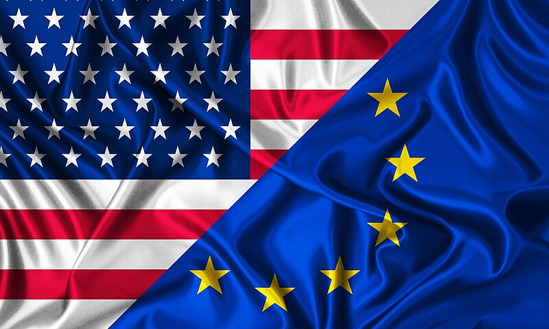 Flags of the United States and the European Union as a symbol of cooperation